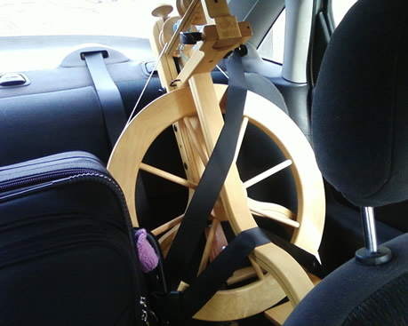 Schacht Matchless wheel being transported in the car