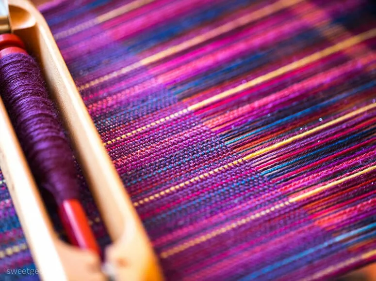 On the loom, leftover bits of Tough Love Sock and CashLuxe Fine 