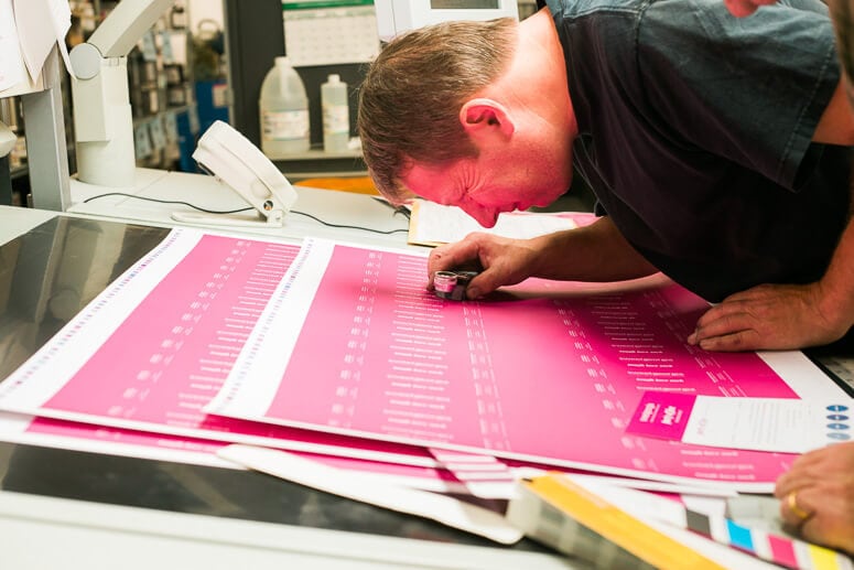 At the printers, checking the density of the pink