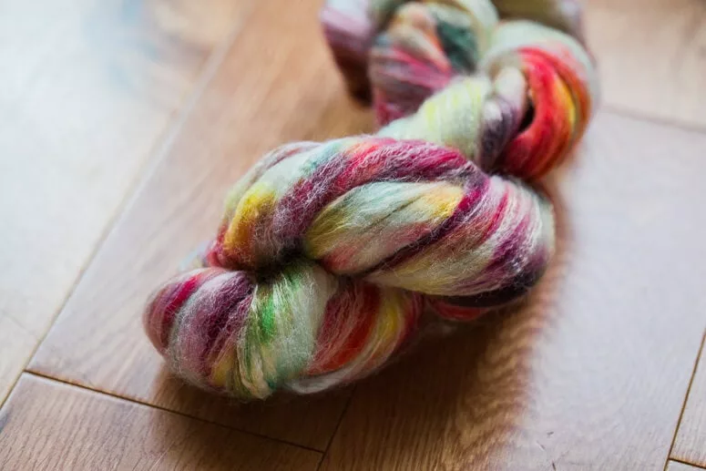 One of my bumps of "souvenir" fibre dyed with all the bits of leftover dye that students poured and left behind