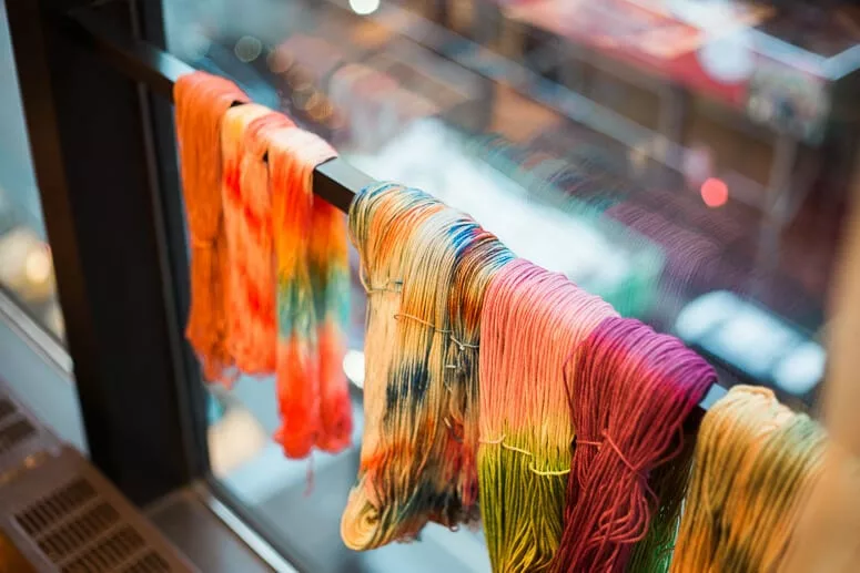 Drying demonstration yarn by the big windows overlooking 46th Street
