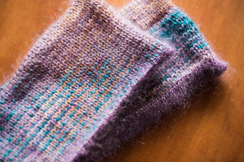 Vignette Mitts, designed by Meg Roke and knit by Charlotte Lee, using the SweetGeorgia Sock Yarn Club "Sleepyhead" together with Silk Mist in Wisteria