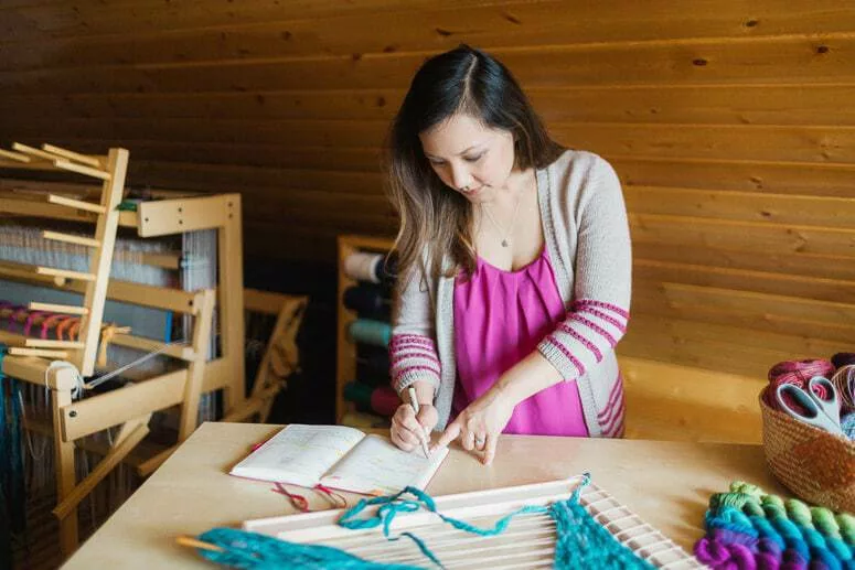 Spring cleaning in the attic craft room to make room for more projects. A DIY frame loom with some handspun yarn on it, waiting to be finished.