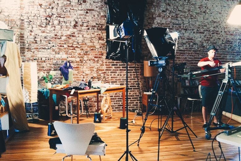 Filming my "Spinning Dyed Fibers" Craftsy class at a burrito factory-turned-house