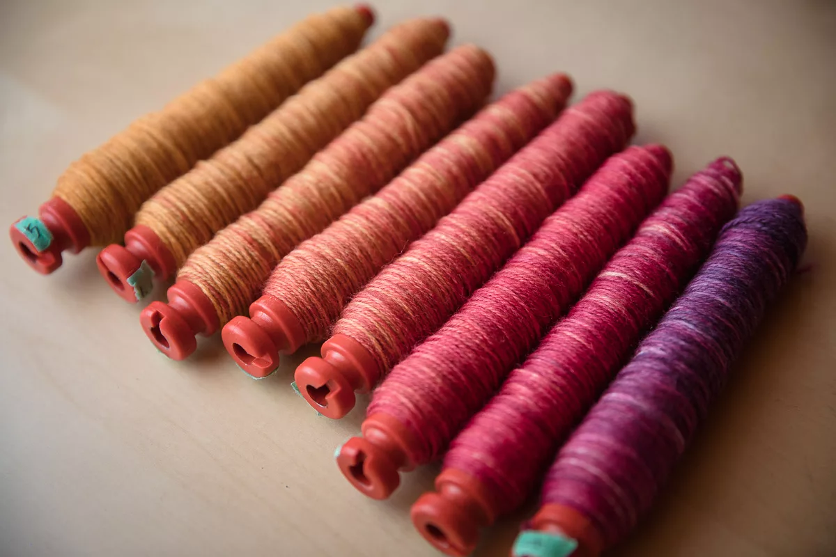 SweetGeorgia Sock Blank in Wanderlust, wound into gradient on weaving pirns