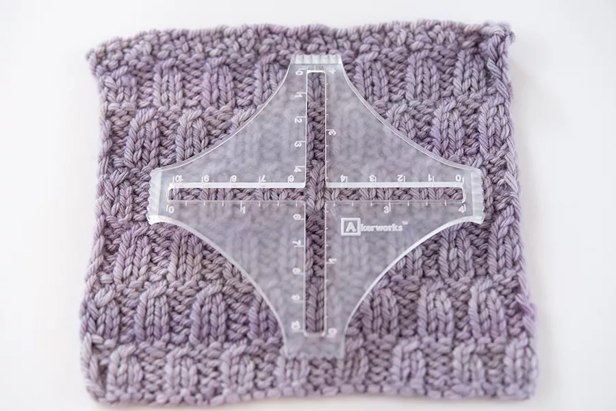 Measuring a knitted gauge swatch in worked in superwash worsted