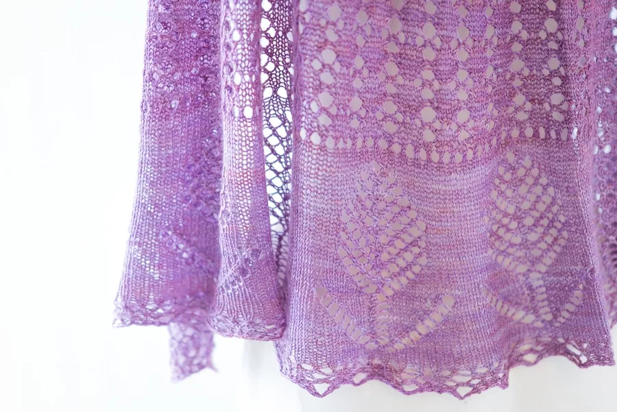 Close up detail of lace flowers in Evening Fields lace shawl pattern