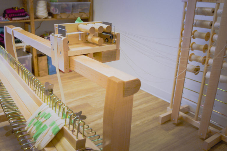 Exploring Sectional Warping for Weaving Yarns