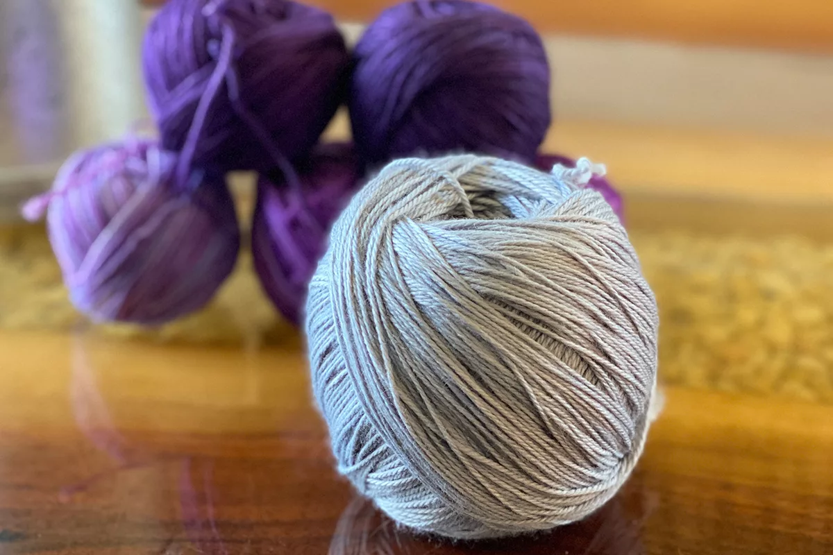 balled yarns on a table