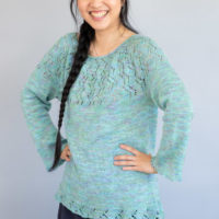 Follow the Tide knitting pattern by Tabetha Hedrick with lace yoke details