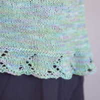 Follow the Tide knitting pattern by Tabetha Hedrick with lace yoke details