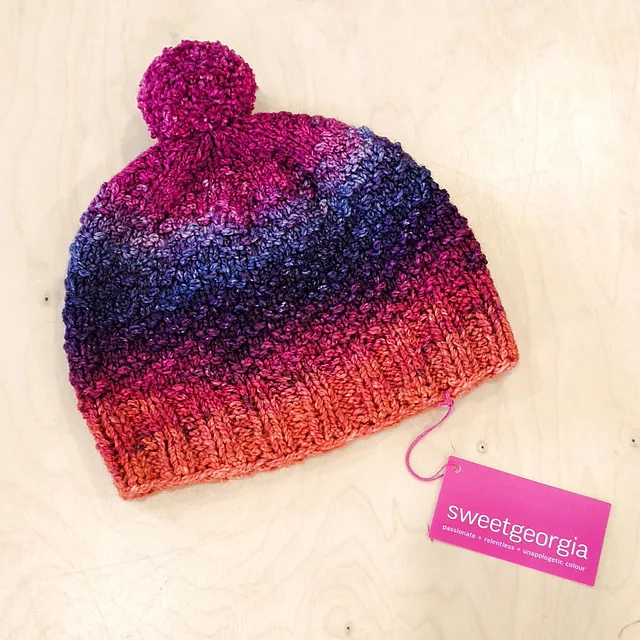 Charlotte Lee's Glas hat project knit and crochet using SweetGeorgia Lighthouse sock yarn blank