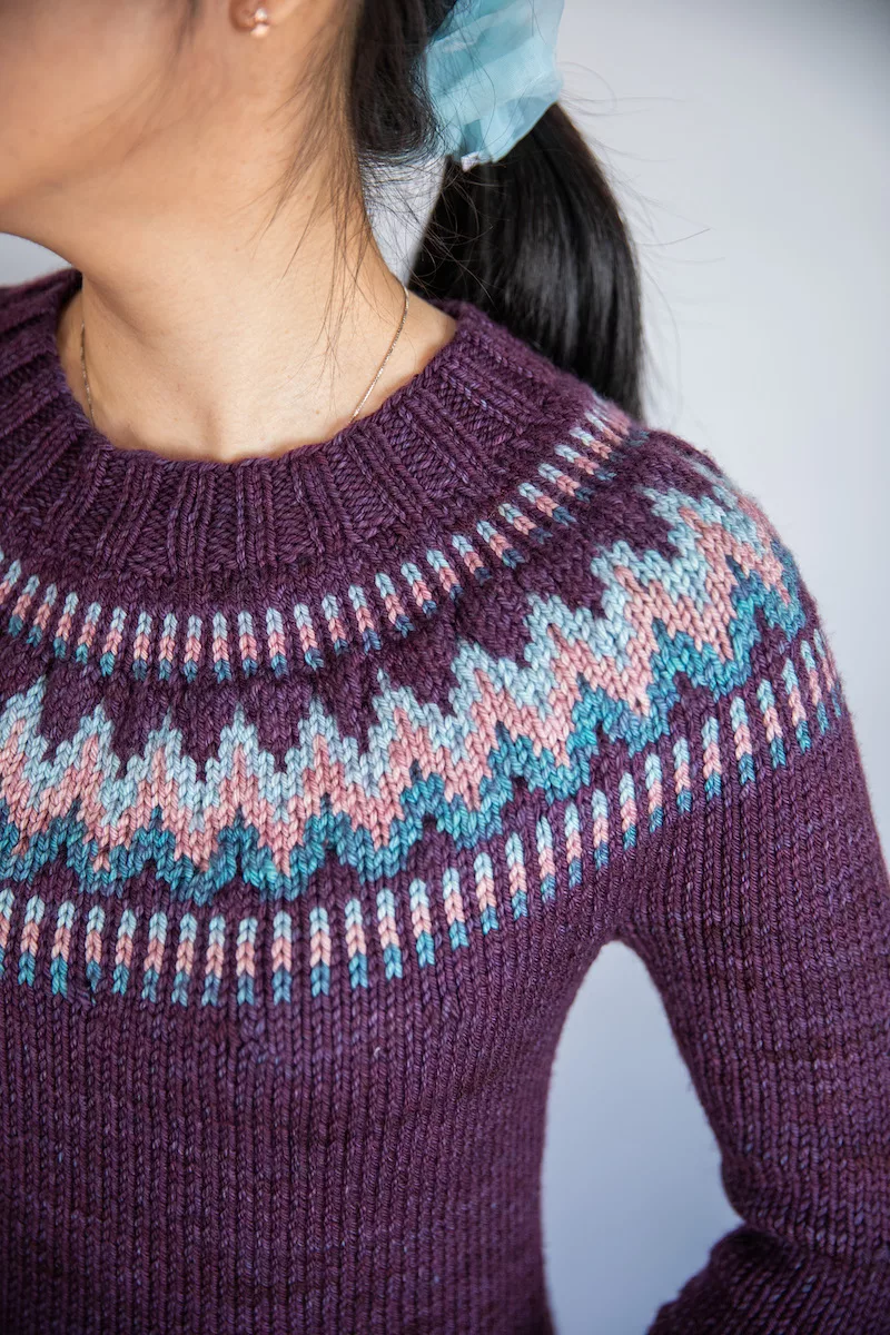 Front shoulder of knit colourwork yoke in The Throwover sweater
