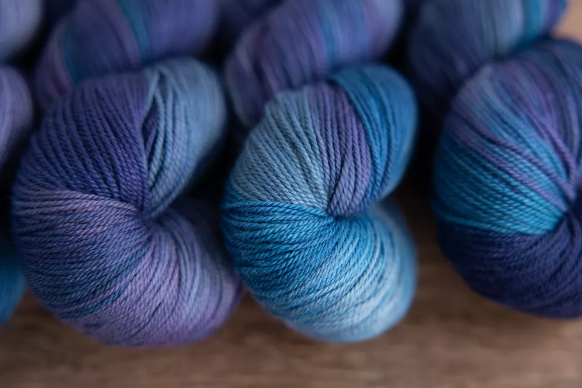 Winter's End Secret Stash Club colourway for March 2024 hand-dyed yarn skeins