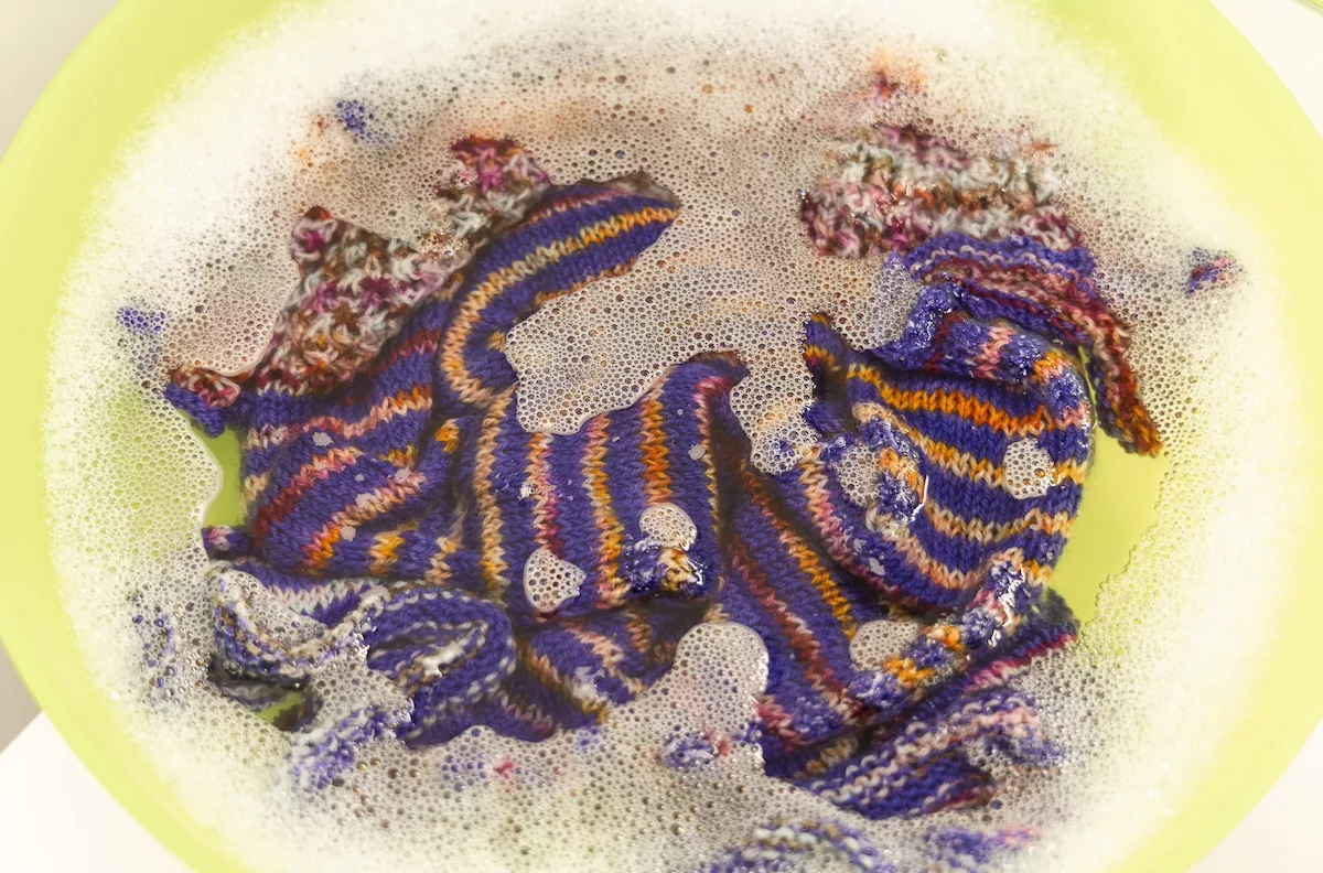 Wylene top knit in Sakura Season double sock blank and Lavender Tough Love Sock wet blocking