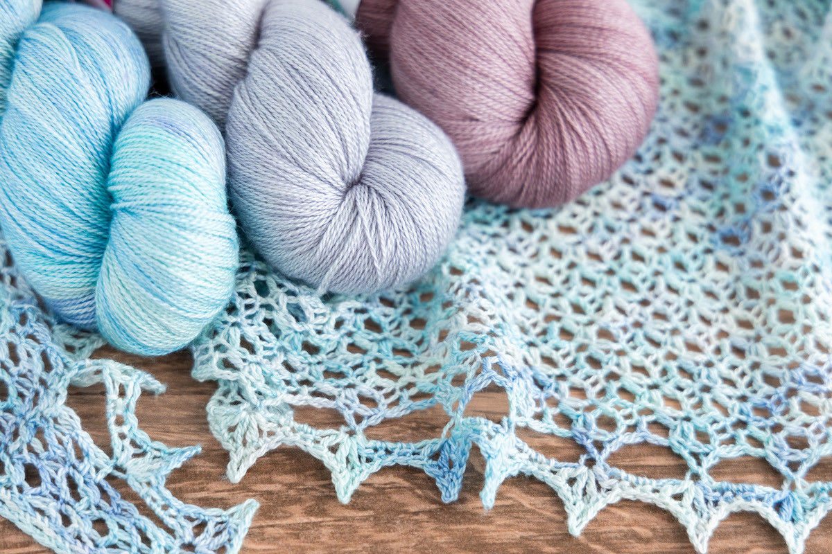 Crochet Lace After Midnight shawl with lace weight SweetGeorgia Merino Silk Lace yarn