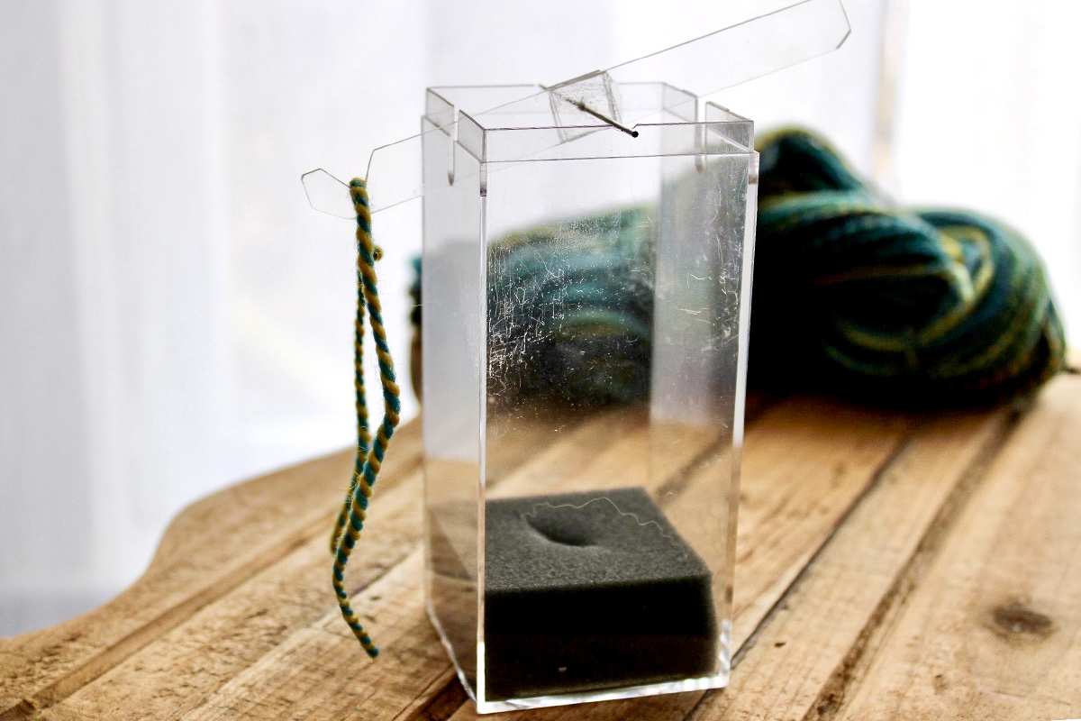 The first step using a yarn balance.