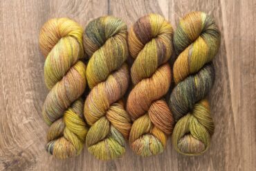 SweetGeorgia Trifecta Fine yarn skeins in Haystacks Club colourway