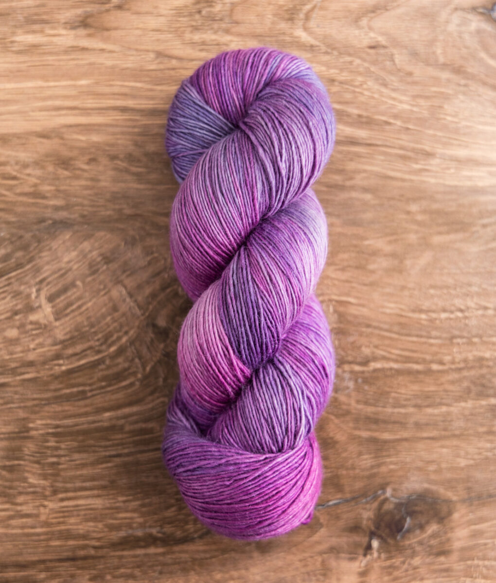 Yarn skein SweetGeorgia Amethyst Magic Yarn Club for August
