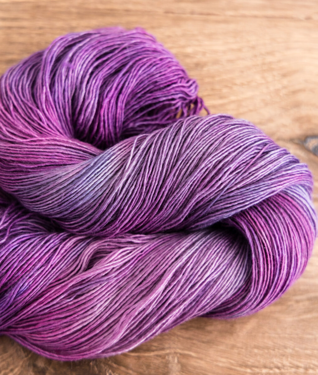 Yarn skein SweetGeorgia Amethyst Magic Yarn Club for August