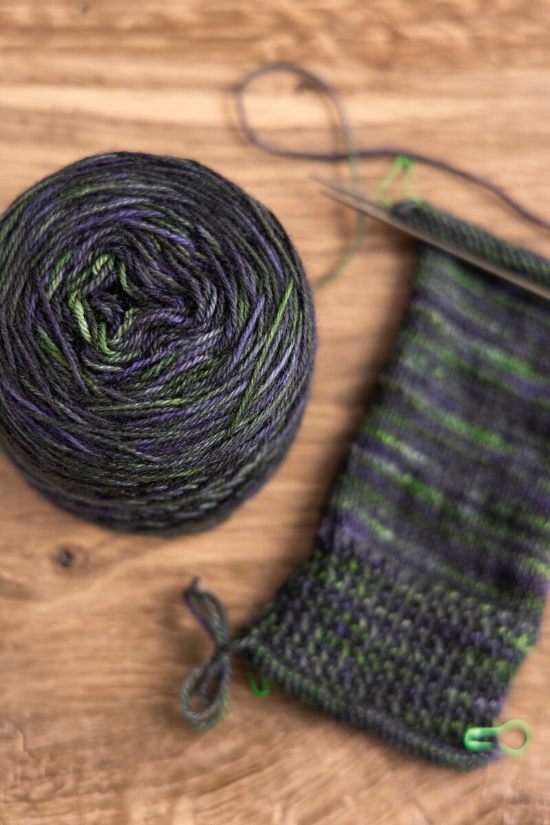 Secret Stash Club - October 2024 Over Easy Socks pattern by Holli Yeoh Knit by Anita Lee
