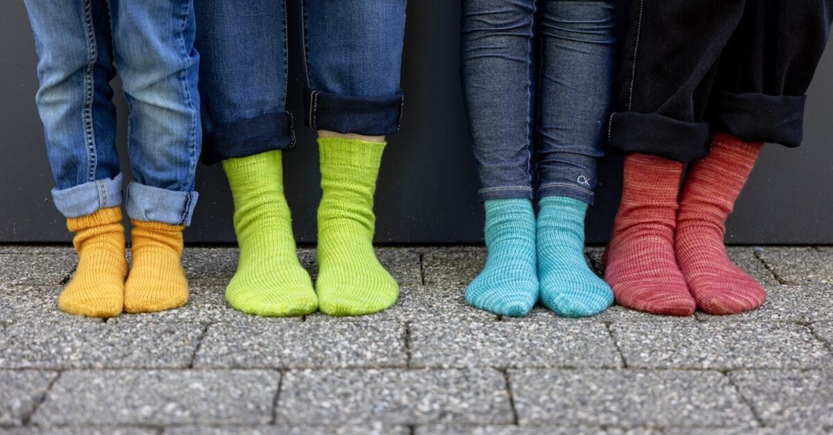 4 pairs of colourful Back to Basics Socks knitting pattern knit in SweetGeorgia Tough Love Sock yarn