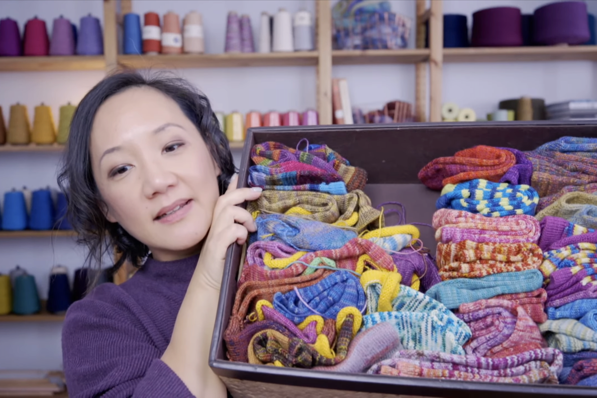 Felicia Lo at October 2024 Taking Back Friday Livestream showing hand knit socks
