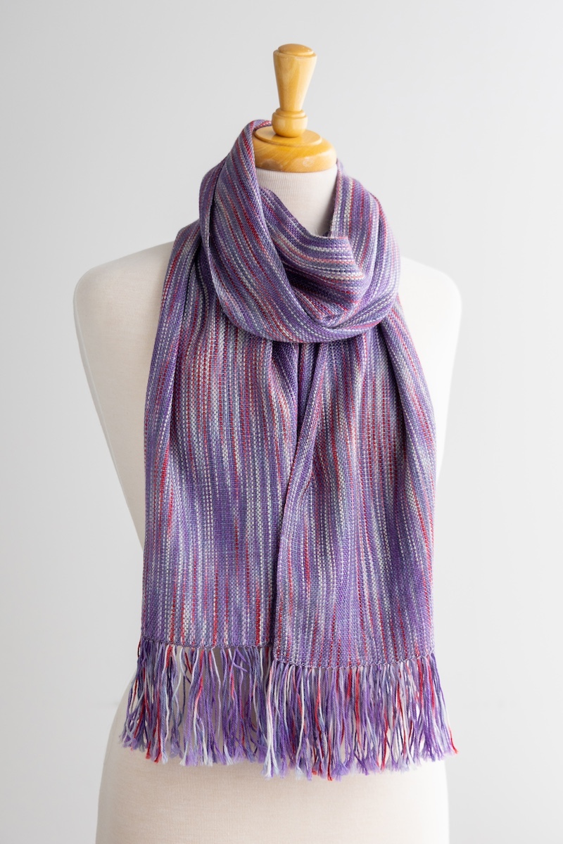 Rigid heddle handwoven scarf in SweetGeorgia Secret Stash Club Lizzy Line