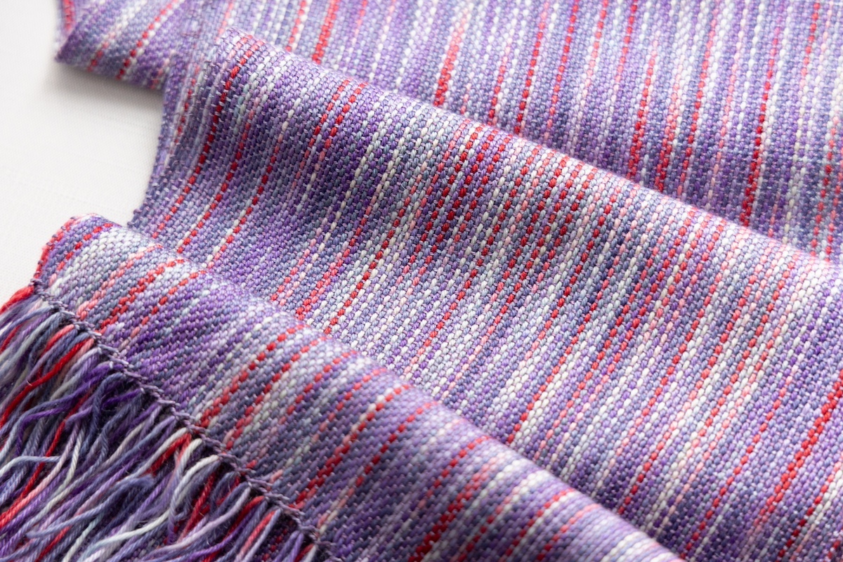 Rigid heddle handwoven scarf in SweetGeorgia Secret Stash Club November 2024