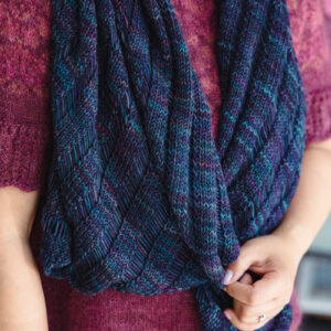 Felicia wearing the Clapotis knit shawl