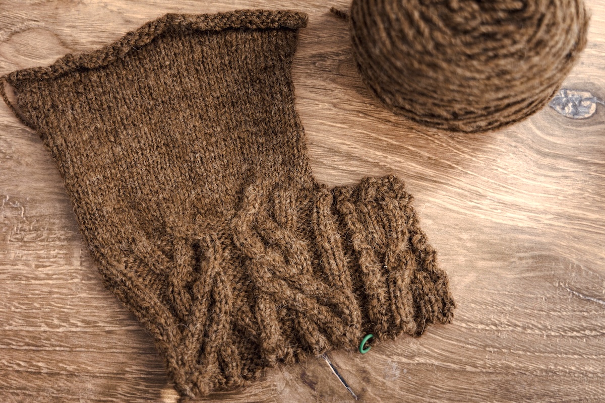 Handspun yarn was knitted into a swatch in both cables and stockinette to evaluate the final fabric. 