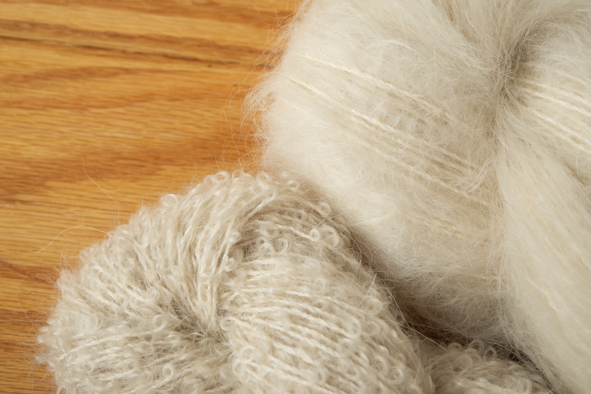From left to right: brushed mohair yarn and boucle mohair yarn