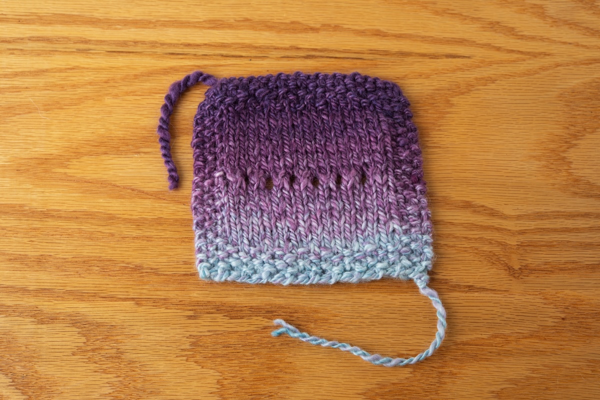 A 2-ply yarn knitted into a swatch. 