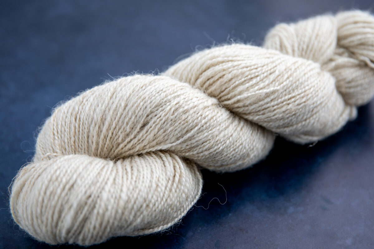 Bluefaced Leicester, alpaca, tow flax, and silk blend yarn.