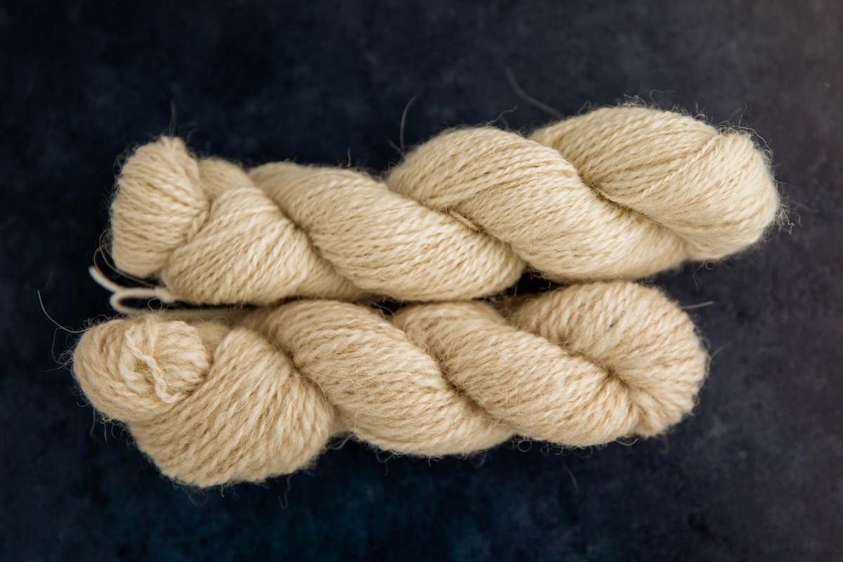 Top to bottom: 100% llama, 50/50 llama and organic Polwarth blend yarn.