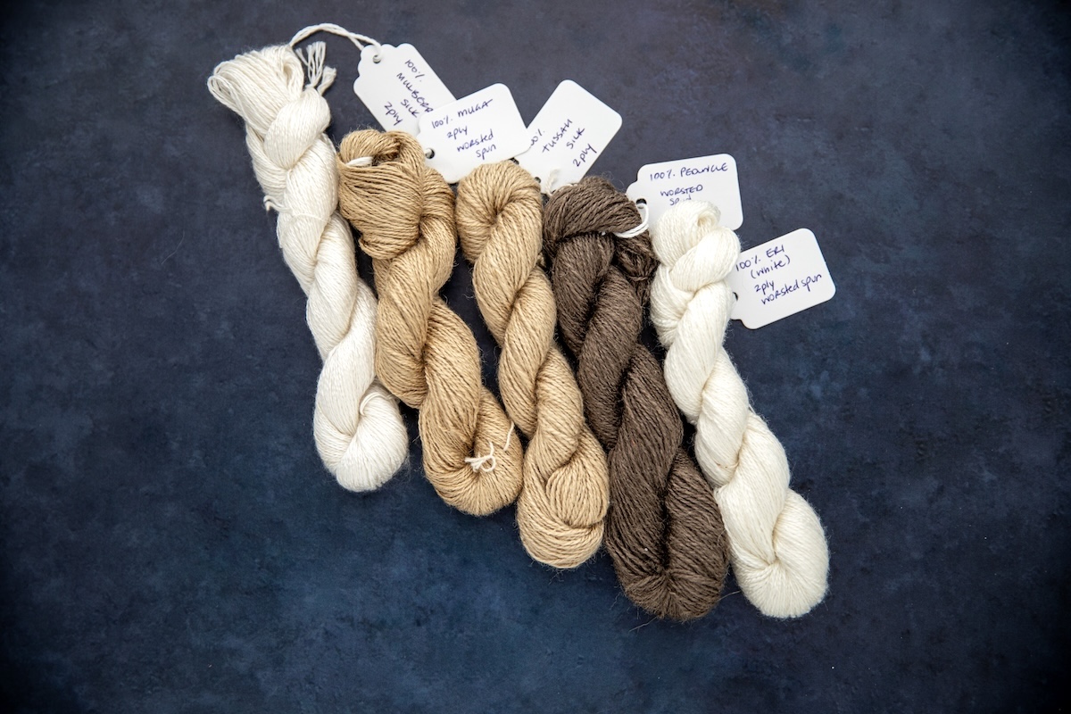 Various handspun silks yarns showcasing their different natural colours. 