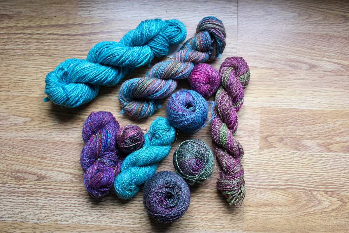 handspun yarns in blues, pinks and purples