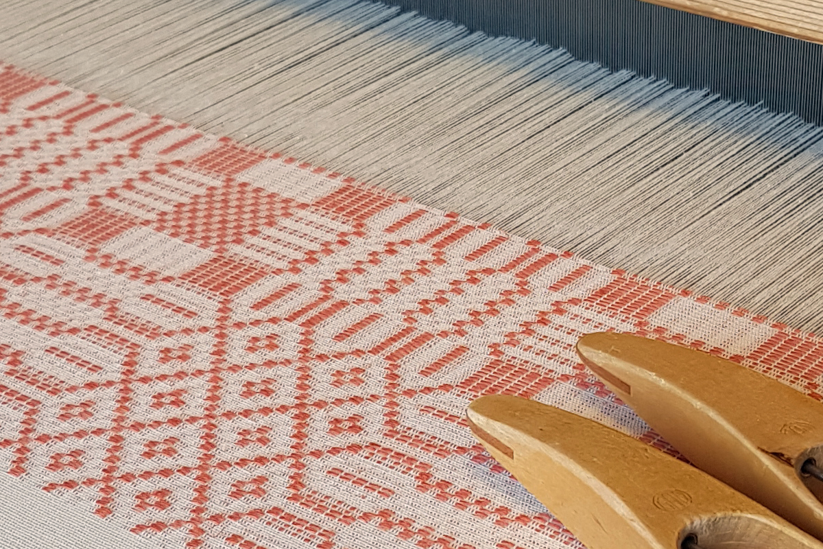 handwoven cloth on the loom 
