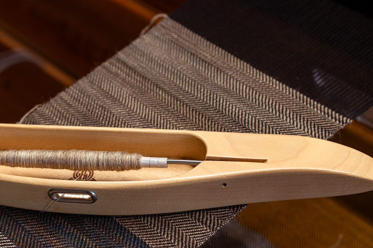 Amanda weaving twill at the loom