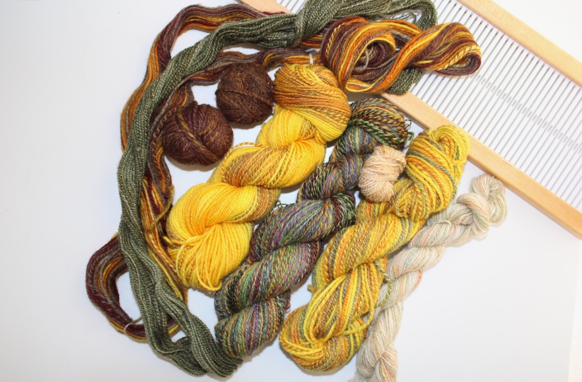 Handspun yarns and a rigid heddle