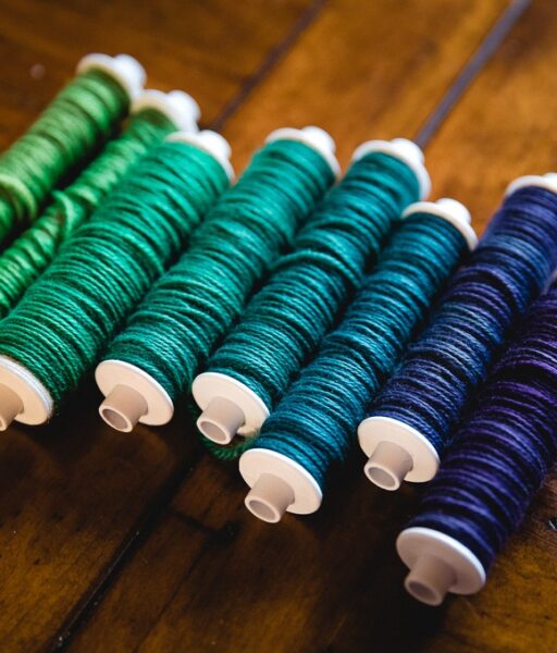 weaving bobbins would in Party of Five mini-skein yarn set in Emerald