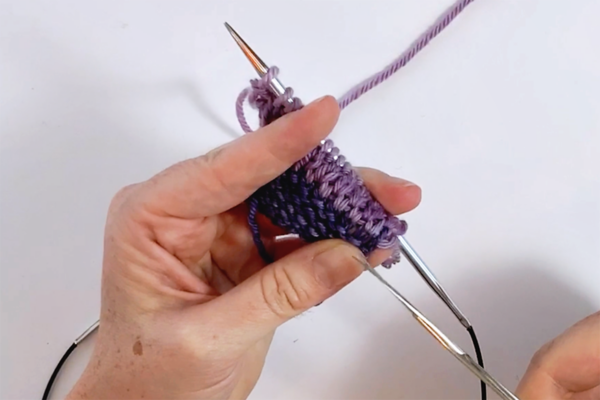 Cutting away the waste yarn