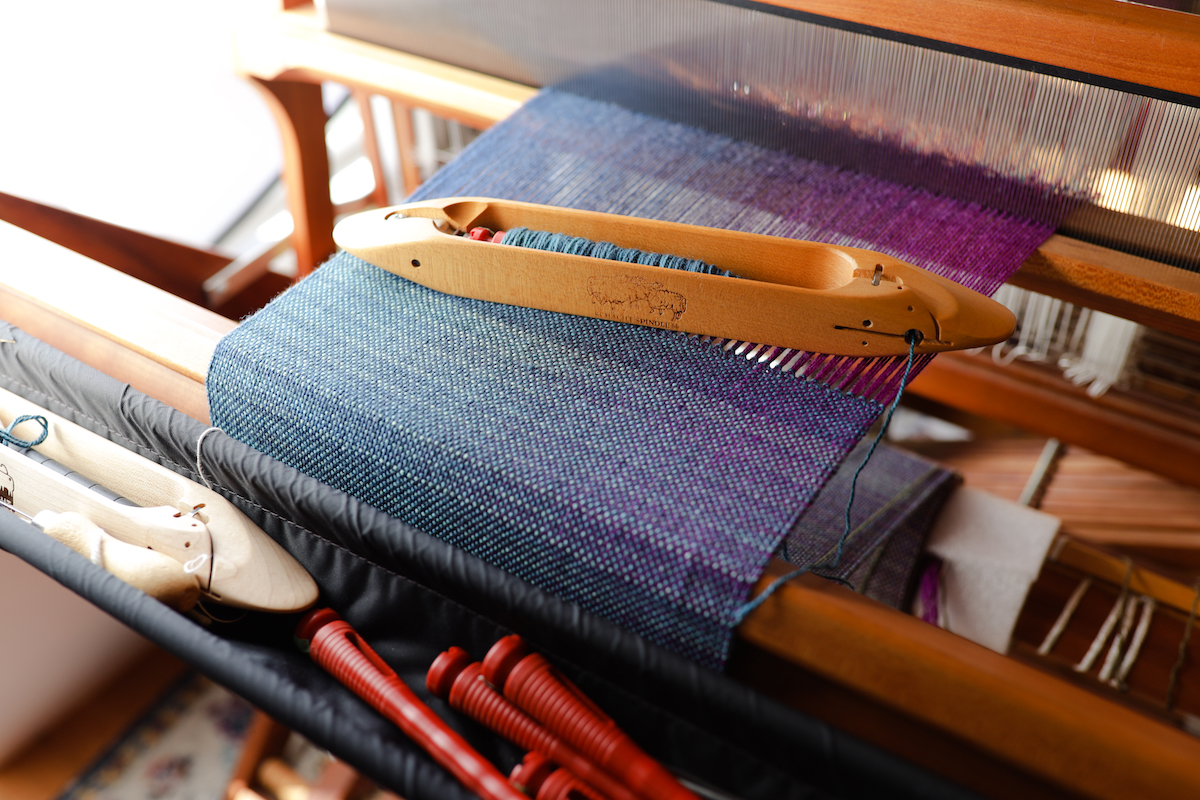 Sock blank scarf weaving in-progress using hand-dyed gradient yarn