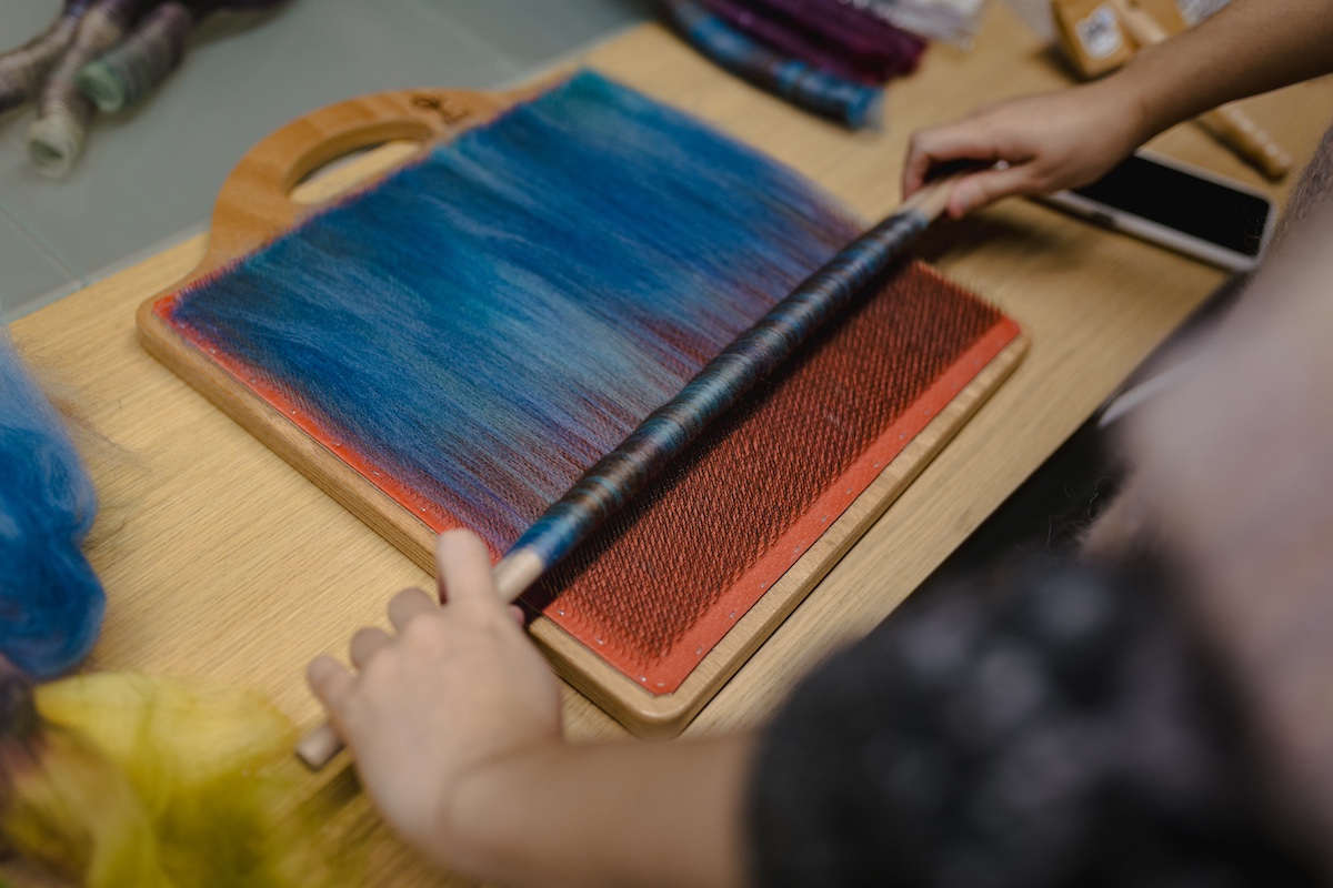 Making rolags and working with a blending board at the SweetGeorgia studio
