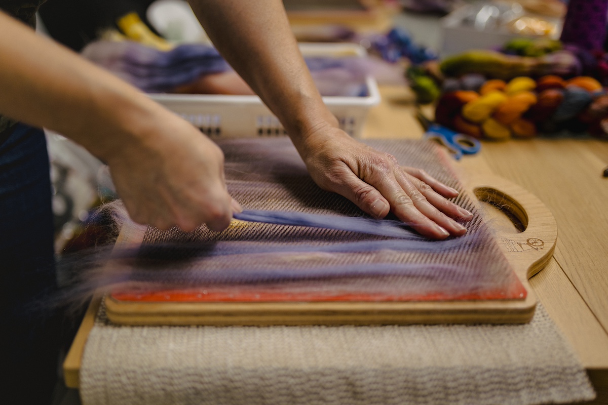 Making rolags and working with a blending board at the SweetGeorgia studio
