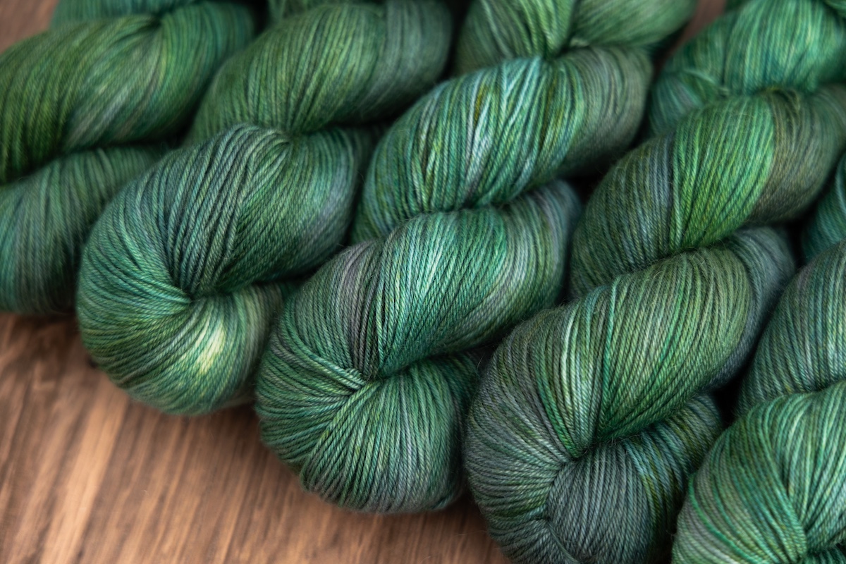 Lunar New Year 2025 hand dyed yarn colourway Wood Snake by SweetGeorgia Yarns