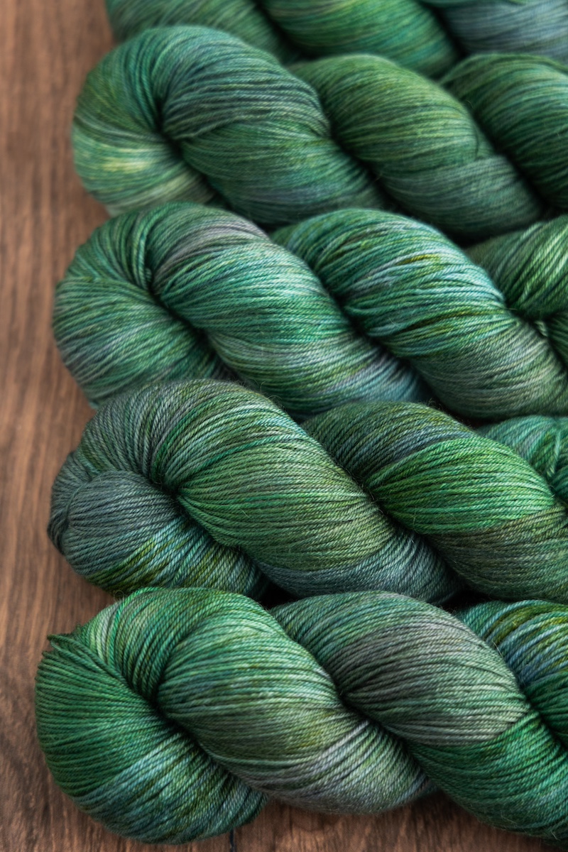 Lunar New Year 2025 hand dyed yarn colourway Wood Snake by SweetGeorgia Yarns