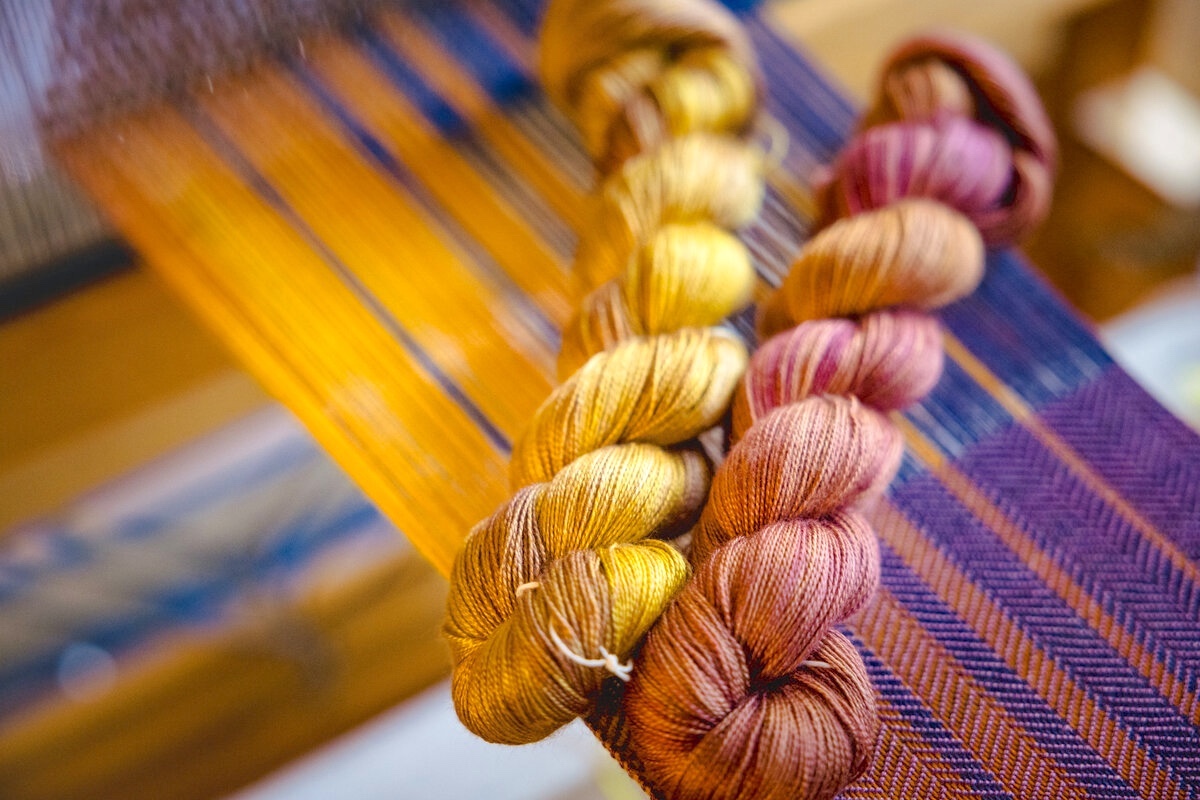 Weaving the Sunset Scarves pattern with two skeins of SweetGeorgia 20/2 Mulberry Silk Lace yarn