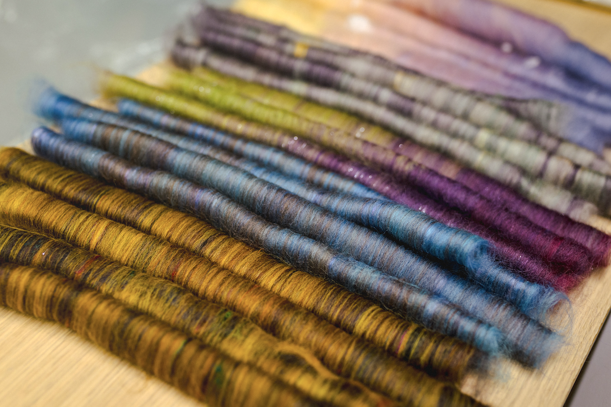 A variety of rolags made by the SweetGeorgia team on blending boards.
