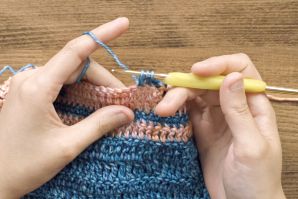 This creates your first cluster. You should have three loops on your hook. Two loops are the first cluster; one loop is the loop we started with.